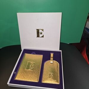 Gold Passport Holder and Luggage Tag Set with Elton's Star Design Logo